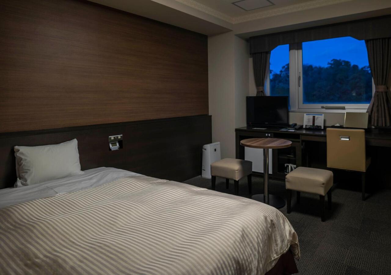 Hotel New Palace Singu Kültér fotó