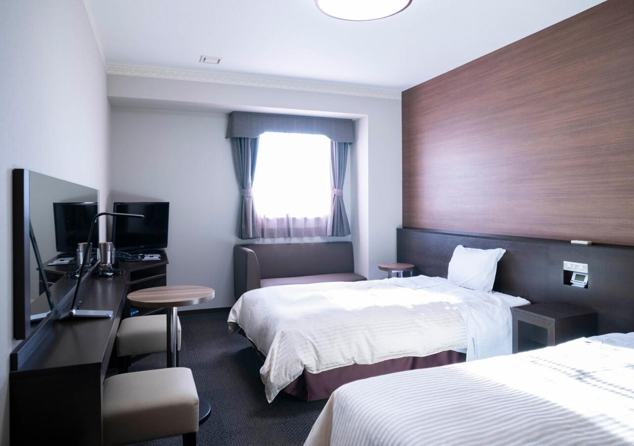 Hotel New Palace Singu Kültér fotó