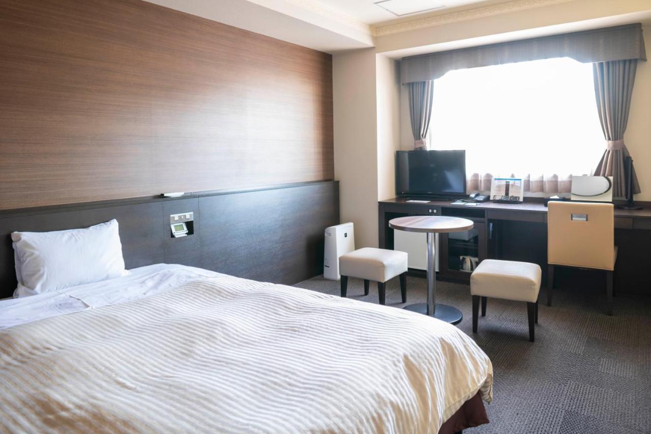 Hotel New Palace Singu Kültér fotó