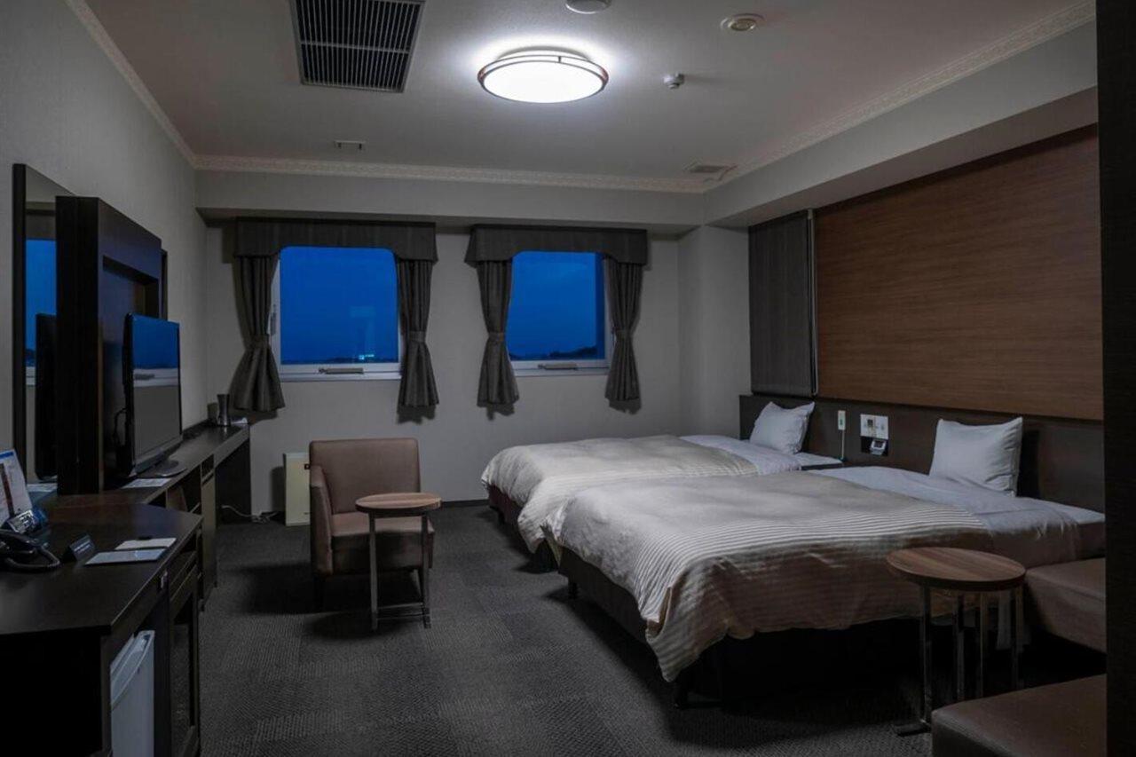 Hotel New Palace Singu Kültér fotó