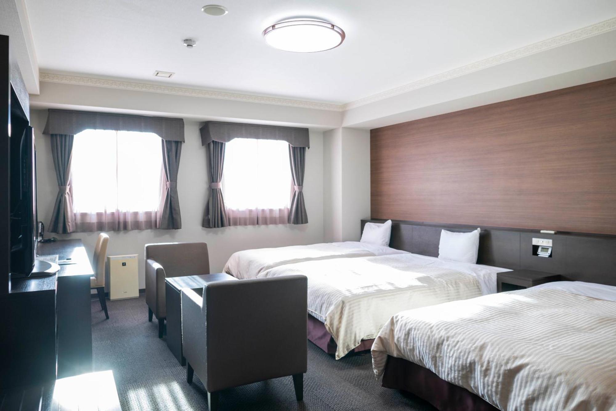 Hotel New Palace Singu Kültér fotó