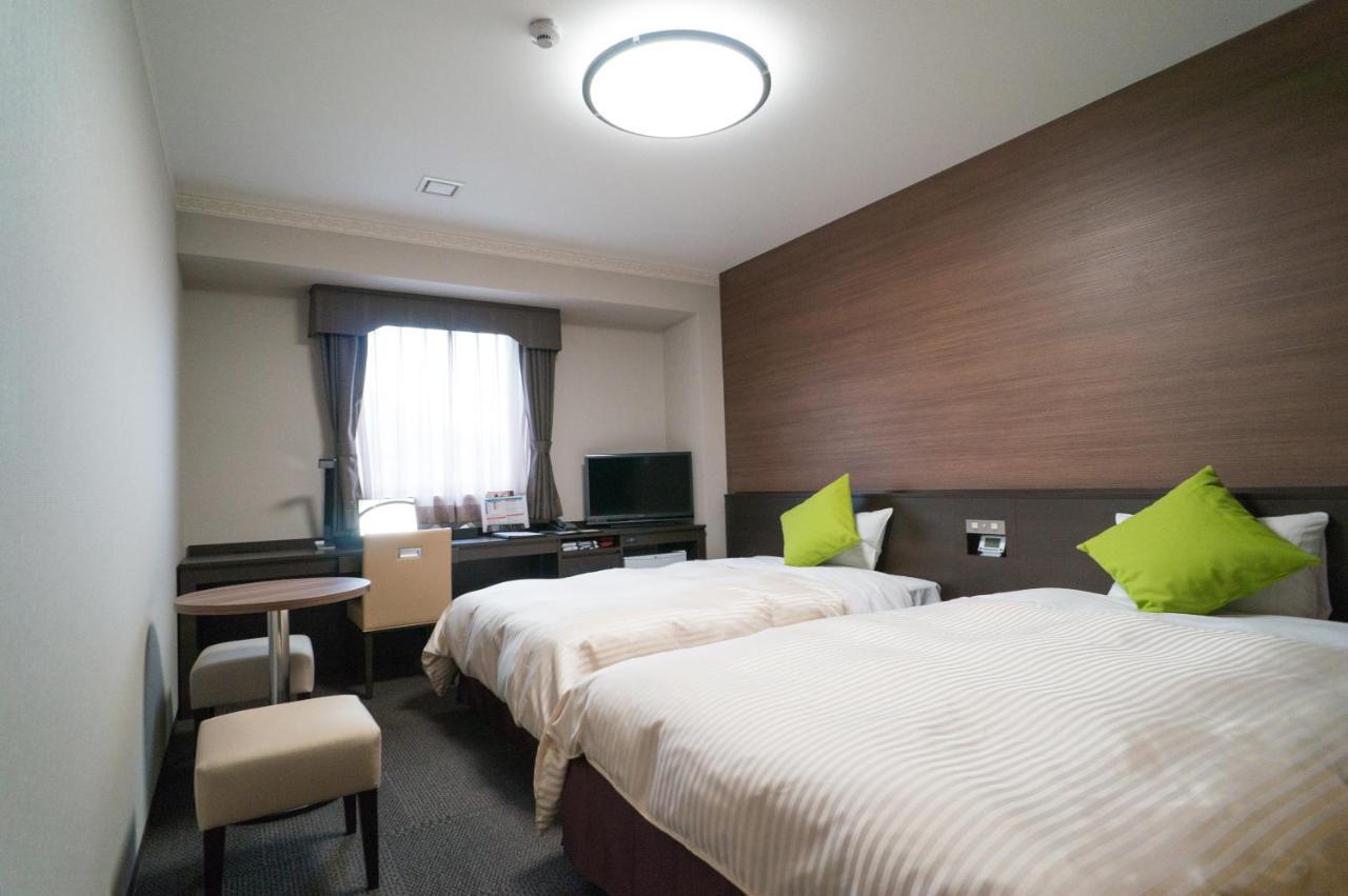 Hotel New Palace Singu Kültér fotó